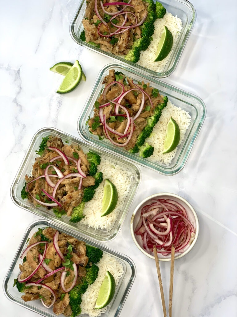 Vegan Coconut Lime Chicken Meal Prep: containers with basmati rice, broccoli, lime, pickled red onion, and soy curl coconut lime chicken 