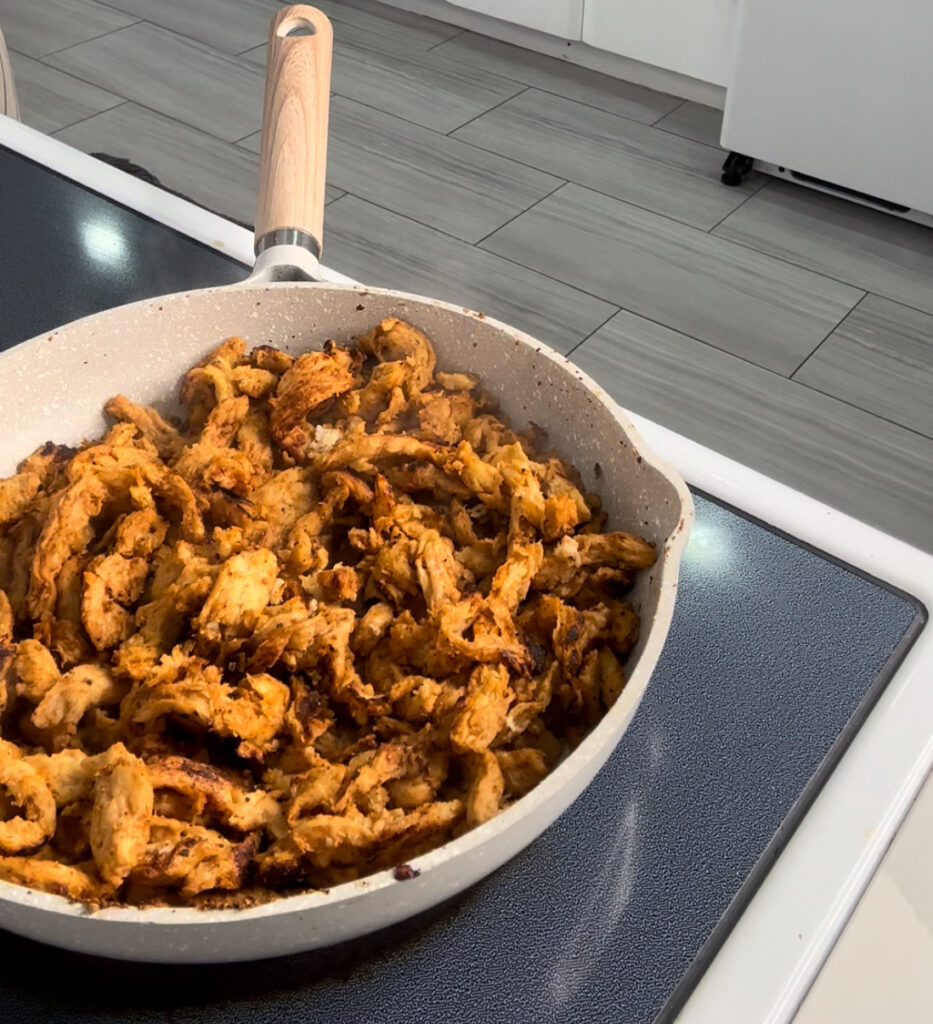 vegan cajun chicken soy curls in frying pan