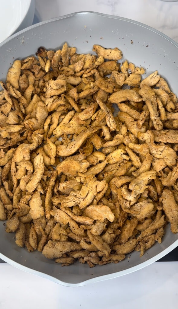 browned soy curls in frying pan 