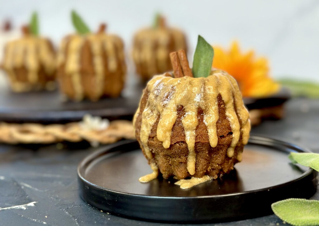 pumpkin cake with 4 in background