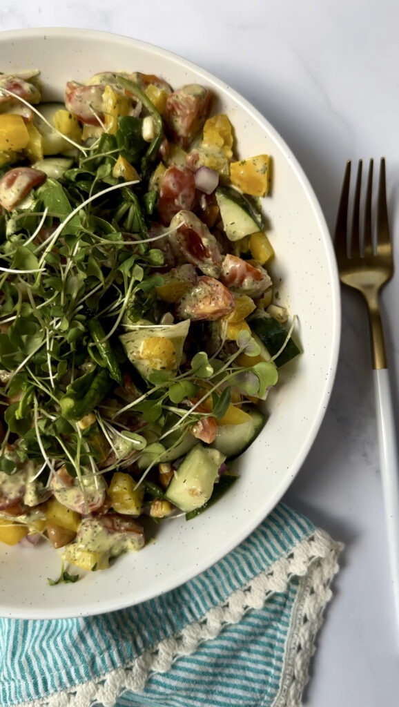 herby ranch & BBQ chickpea salad jar  meal prep poured into a large bowl