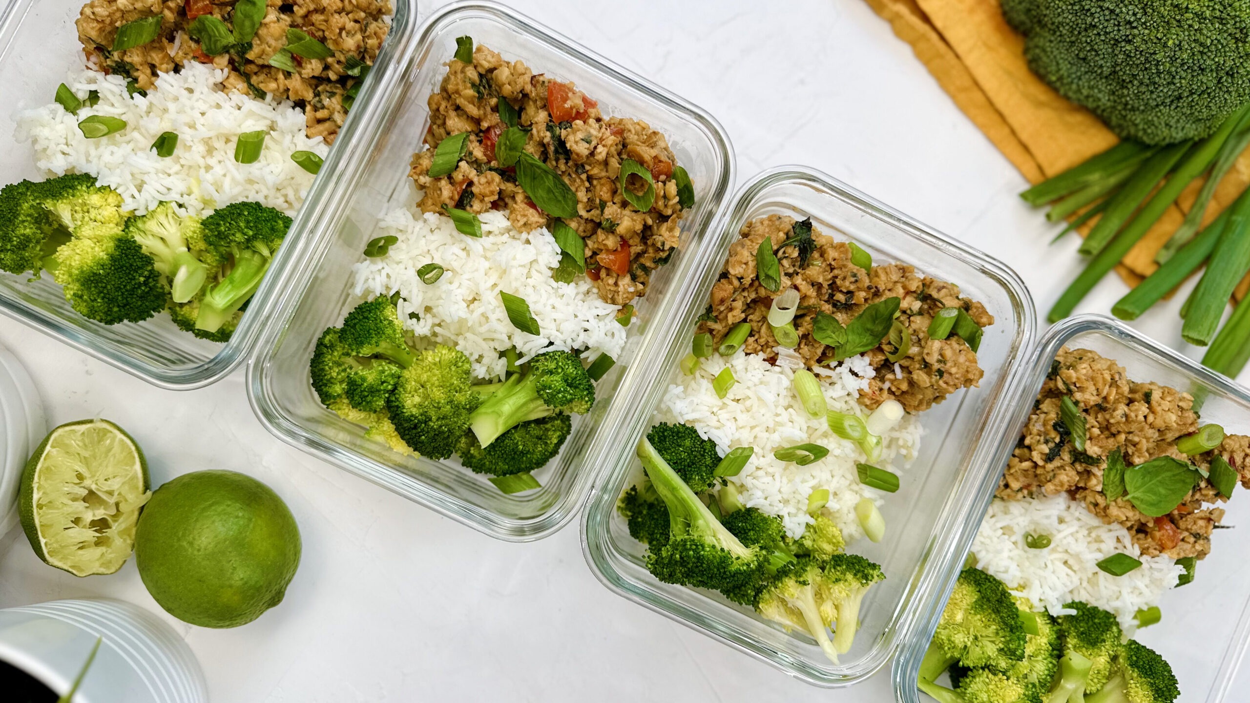 meal prep containers: basil tempeh, rice and broccoli