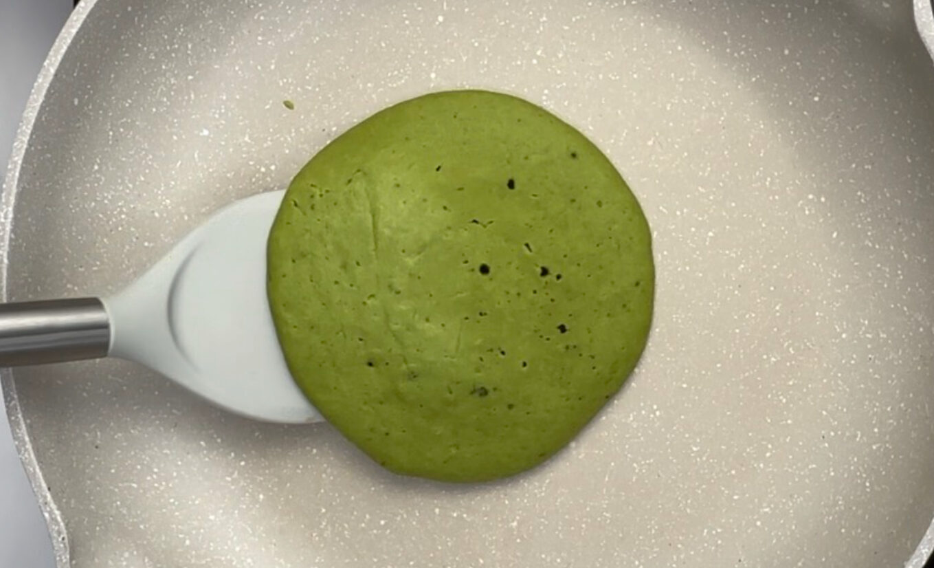 matcha pancake on a frying pan