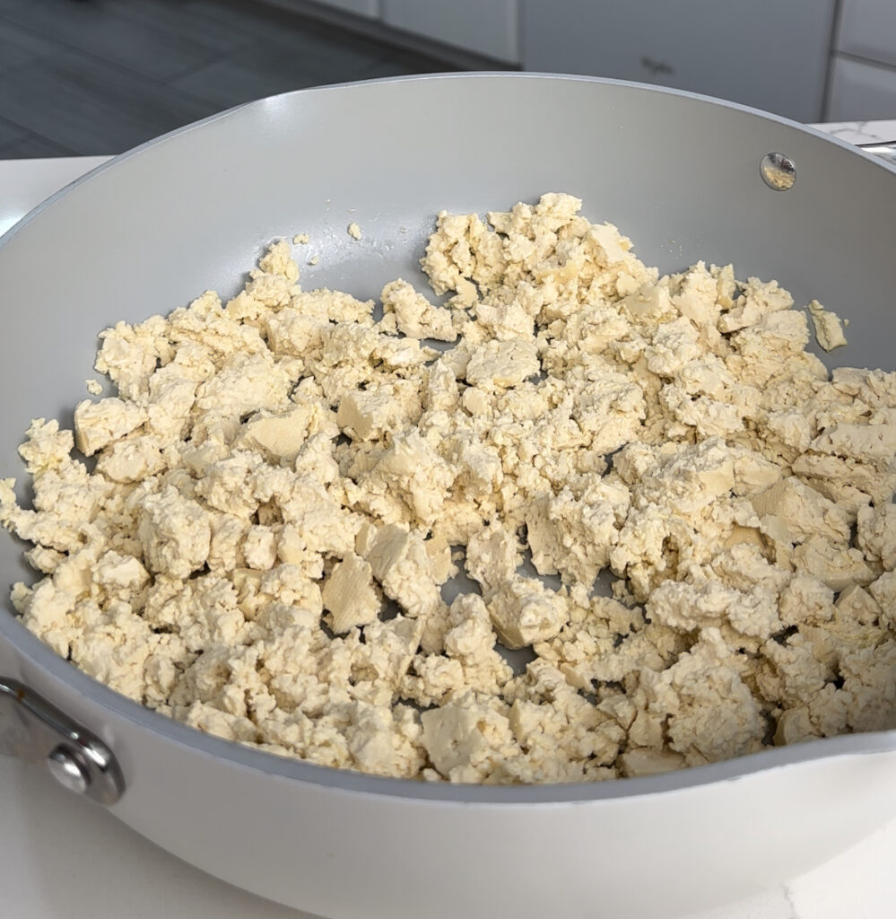 plain tofu crumbled in a pan