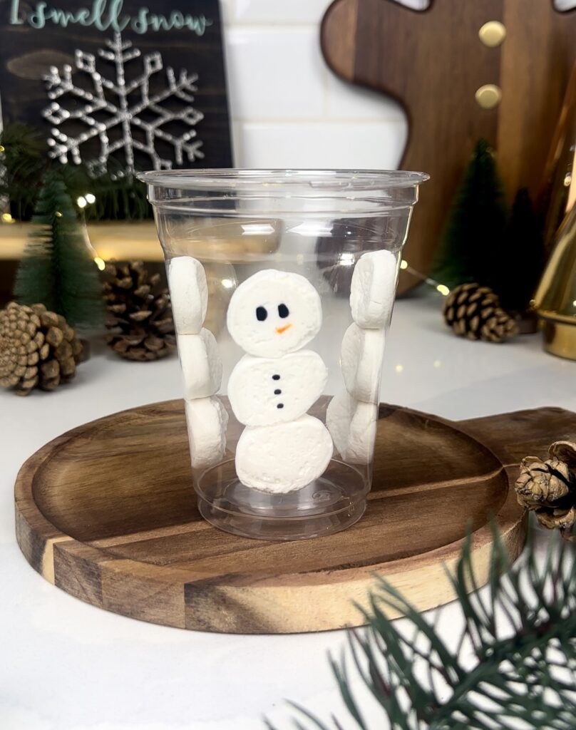 picture of the snowman marshmallows added to the cup