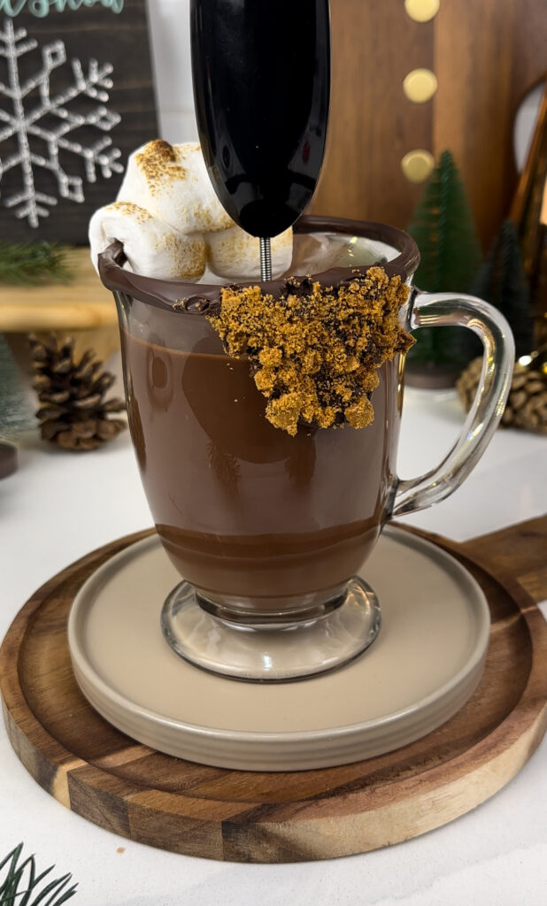 photo of hot chocolate and cookie butter being whisked together. 