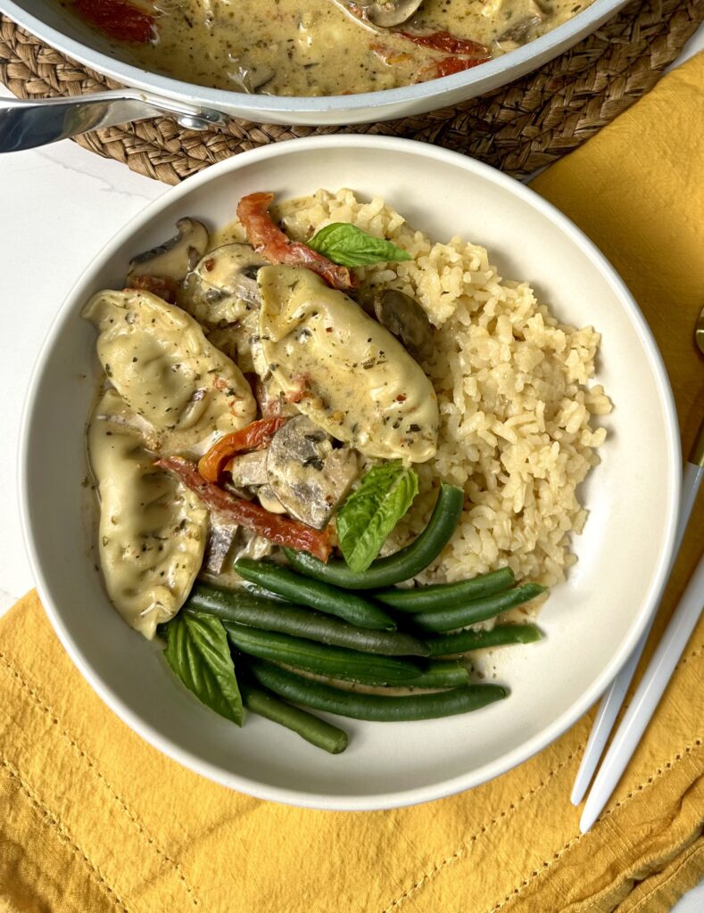 bowl of Marry Me Dumplings, rice, and steamed green beans