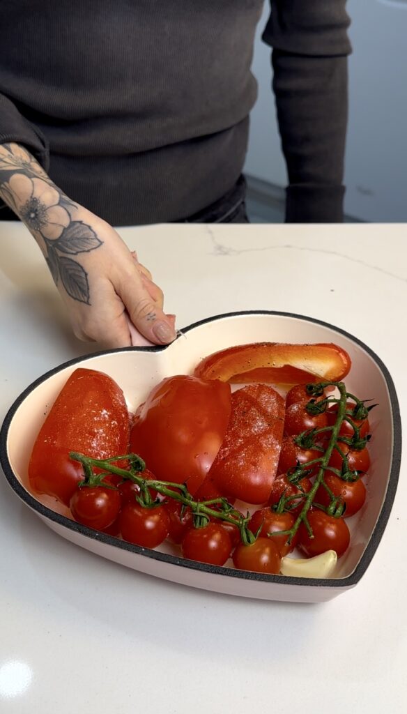 the red pepper, cherry tomatoes and garlic roasted ready to go in the oven