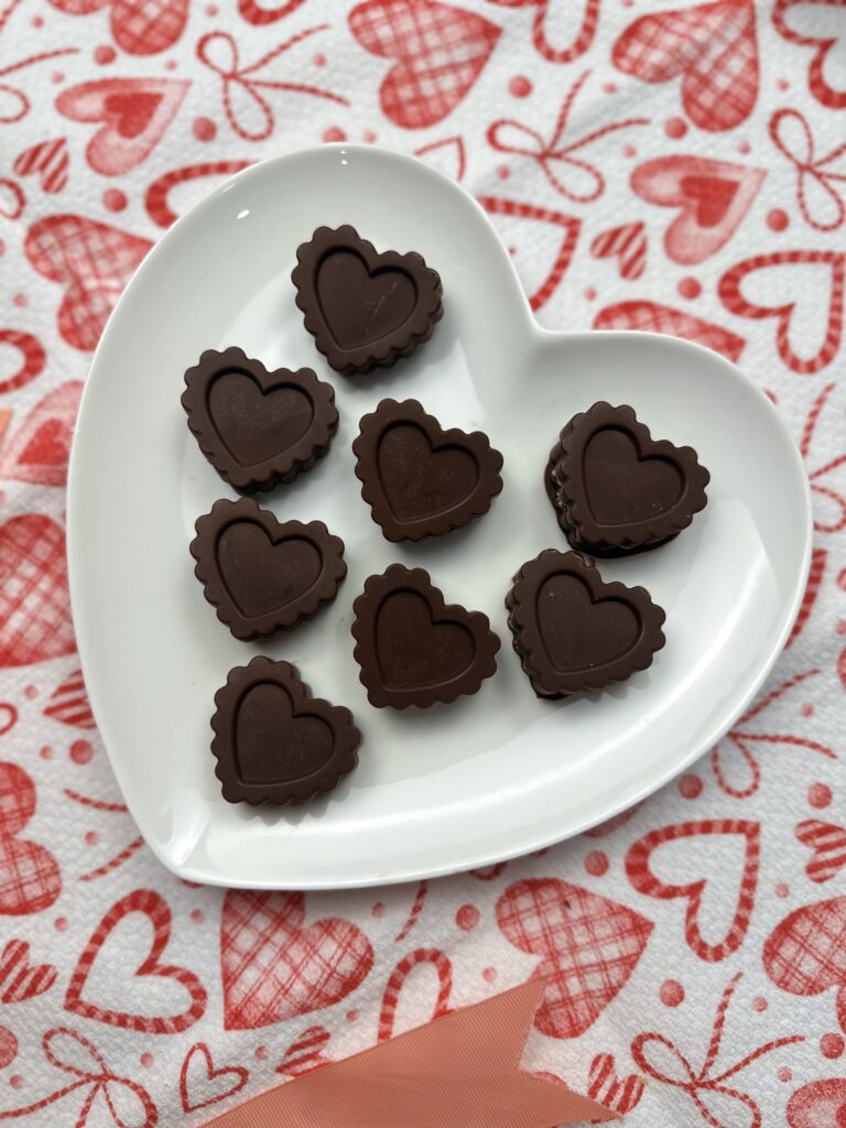 heart shape plate displaying vegan snickers hearts