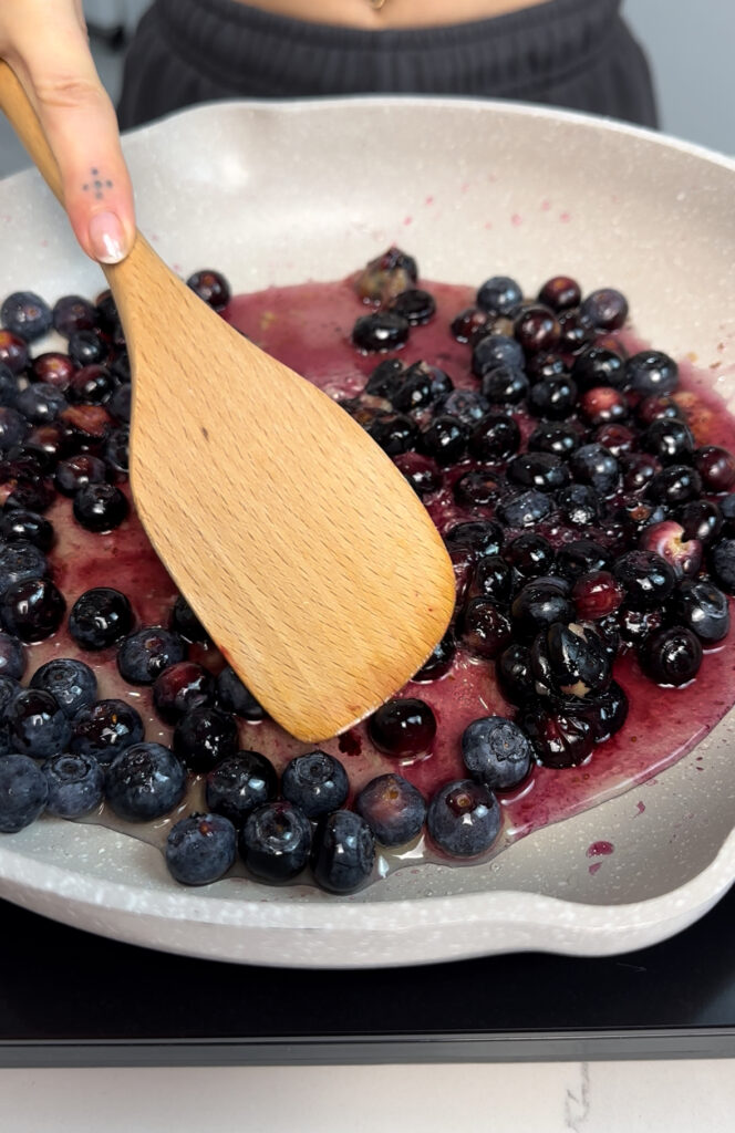 mashing the blueberries for the chia jam