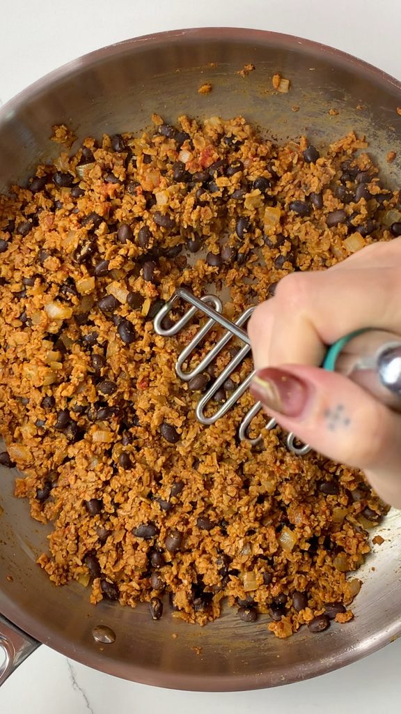 Mash black bean and TVP mixture.