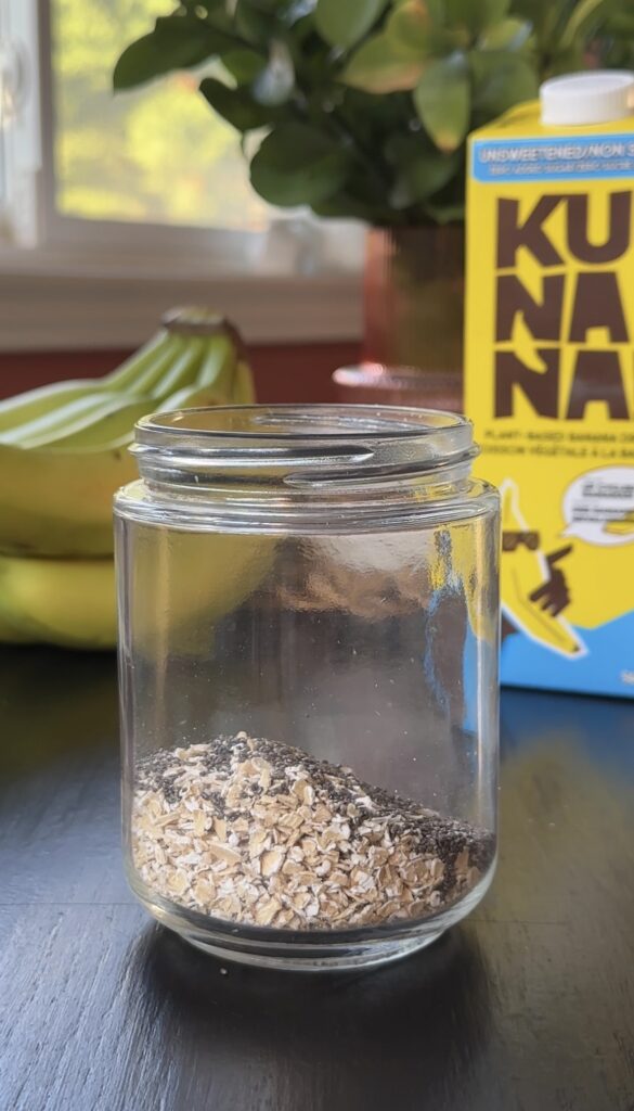 adding chia seeds to the meal prep jar